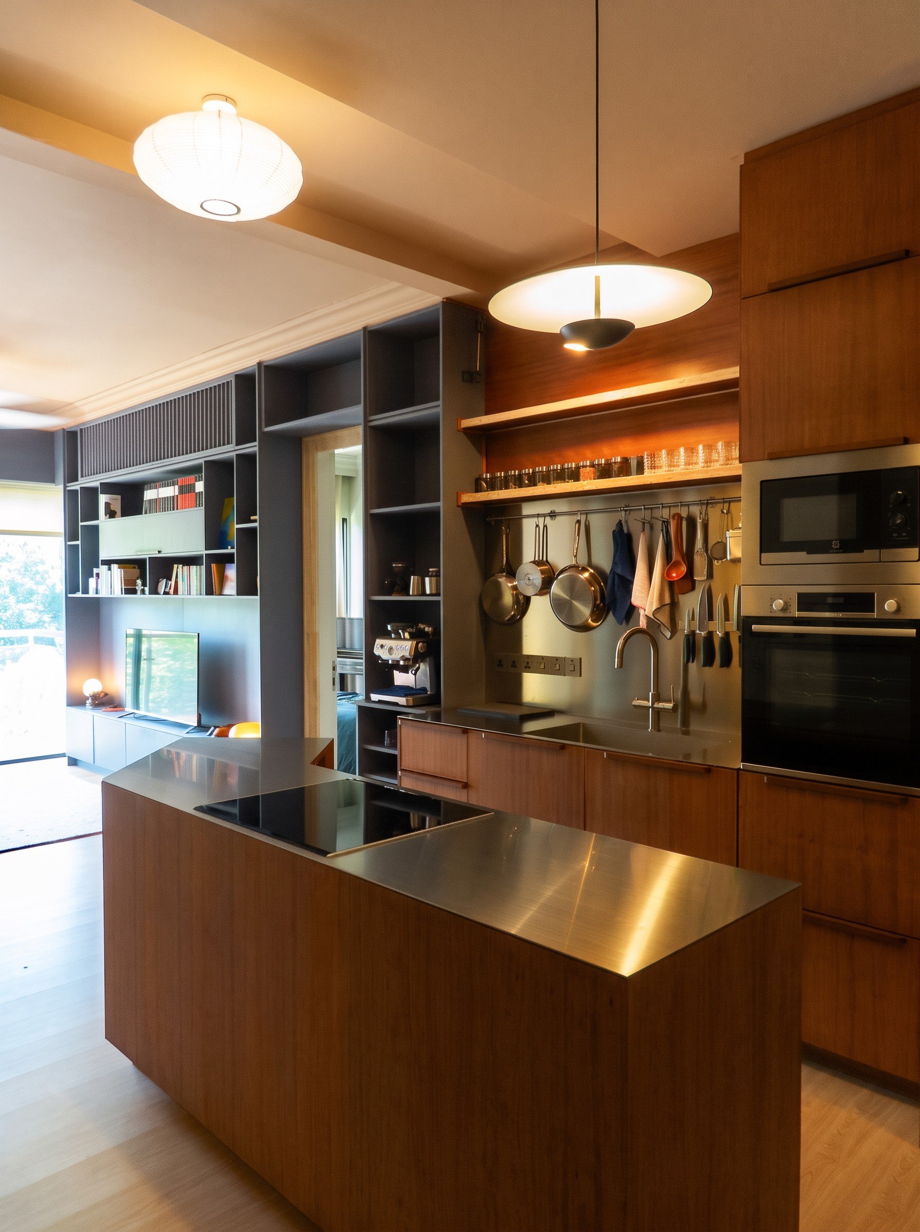 Hampton Residences kitchen with stainless-steel island and timber cabinetry